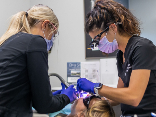 Dentist treating dental patient