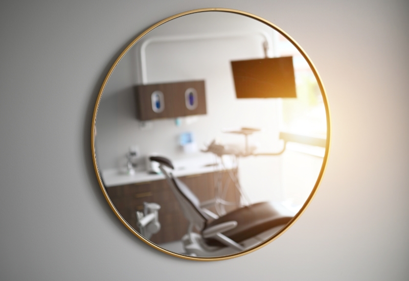 view of dental chair through mirror